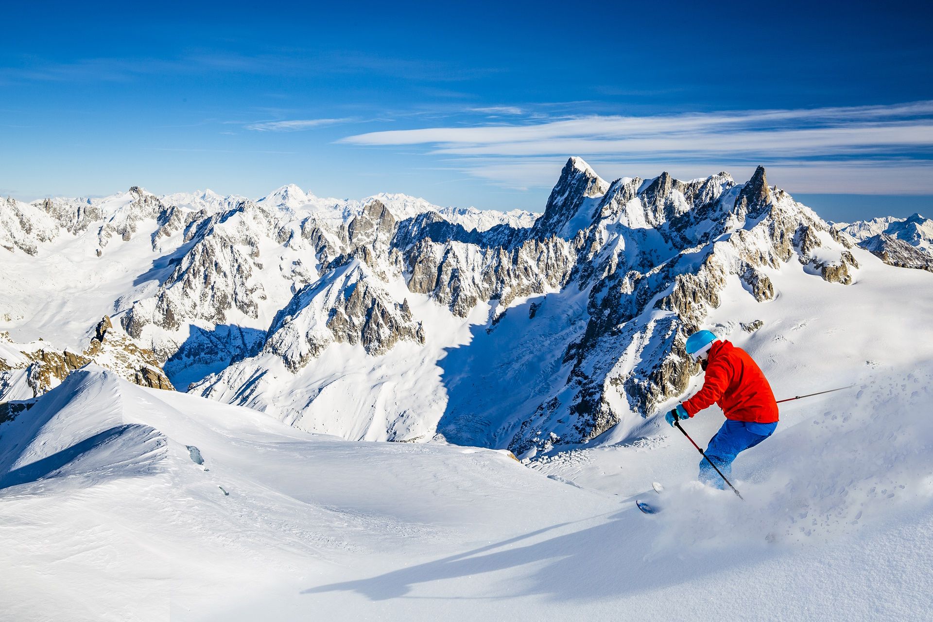 Skiing Vallee Blanche Chamonix with amazing panorama of Grandes Jorasses and Dent du Geant from Aiguille du Midi, Mont Blanc mountain, Haute-Savoie, France.