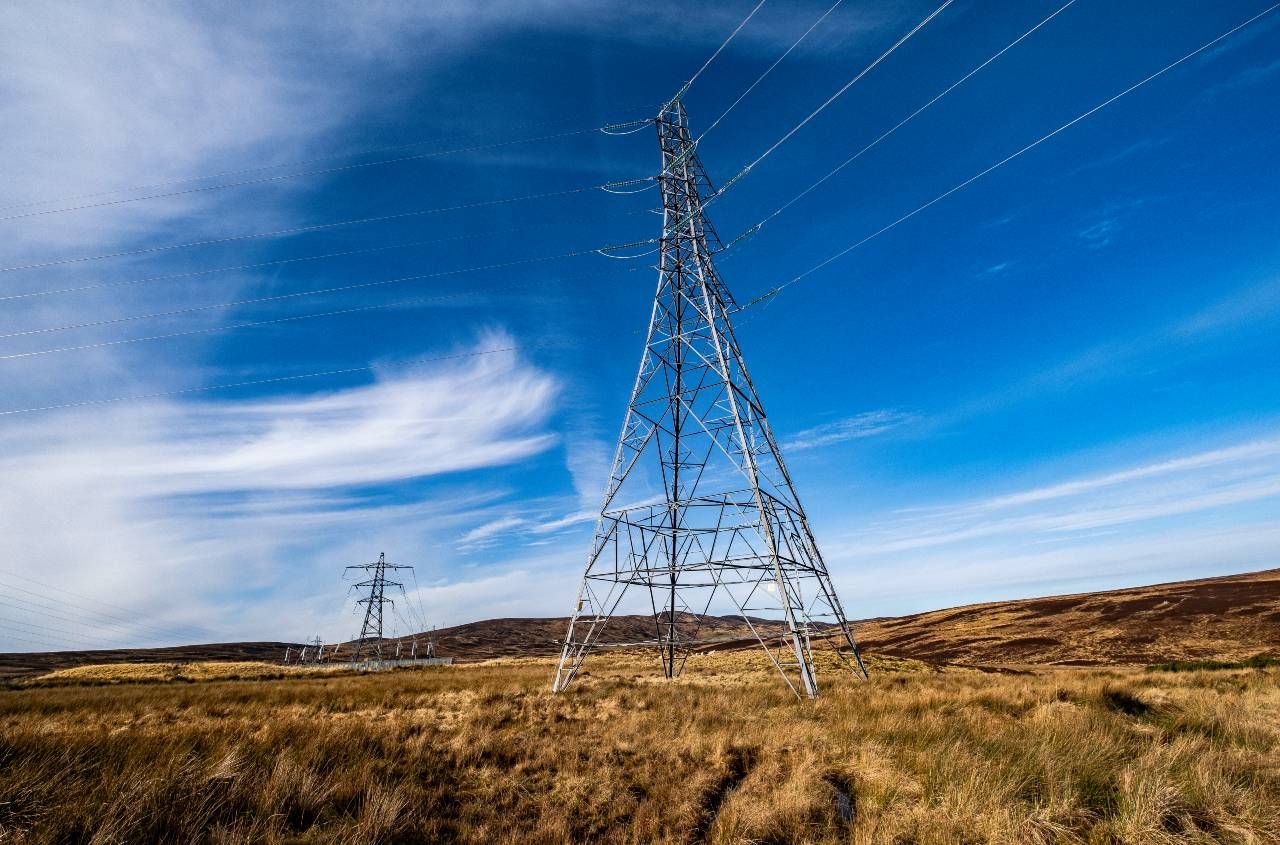 Overhead power lines on a sunny day