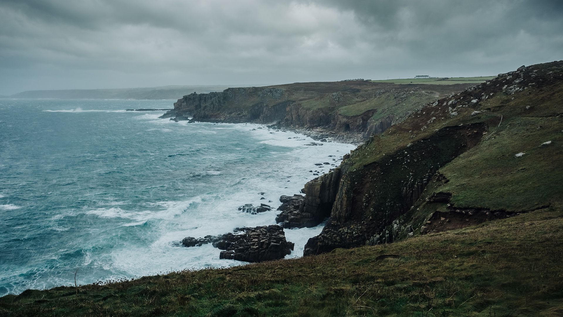 Stormy seas from a clifftop as wind approaches.