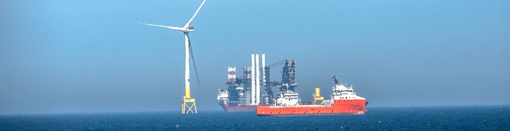 Wind farm installation offshore of Aberdeen, Scotland, in May 2018. Wind farm installation offshore of Aberdeen, Scotland, in May 2018.