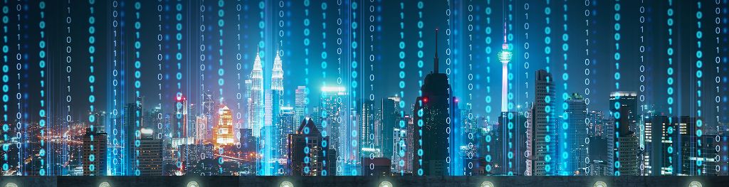 An illuminated night city skyline with vertical superimposed data symbols 0 and 1. An illuminated night city skyline with vertical superimposed data symbols 0 and 1.