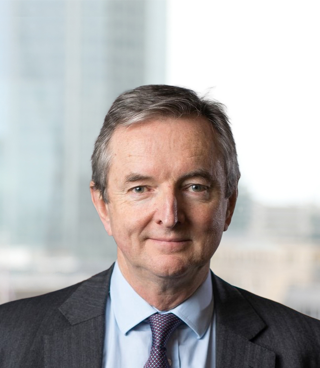 Head and shoulders photo of Simon Thompson wearing a light blue shirt, tie and suit.